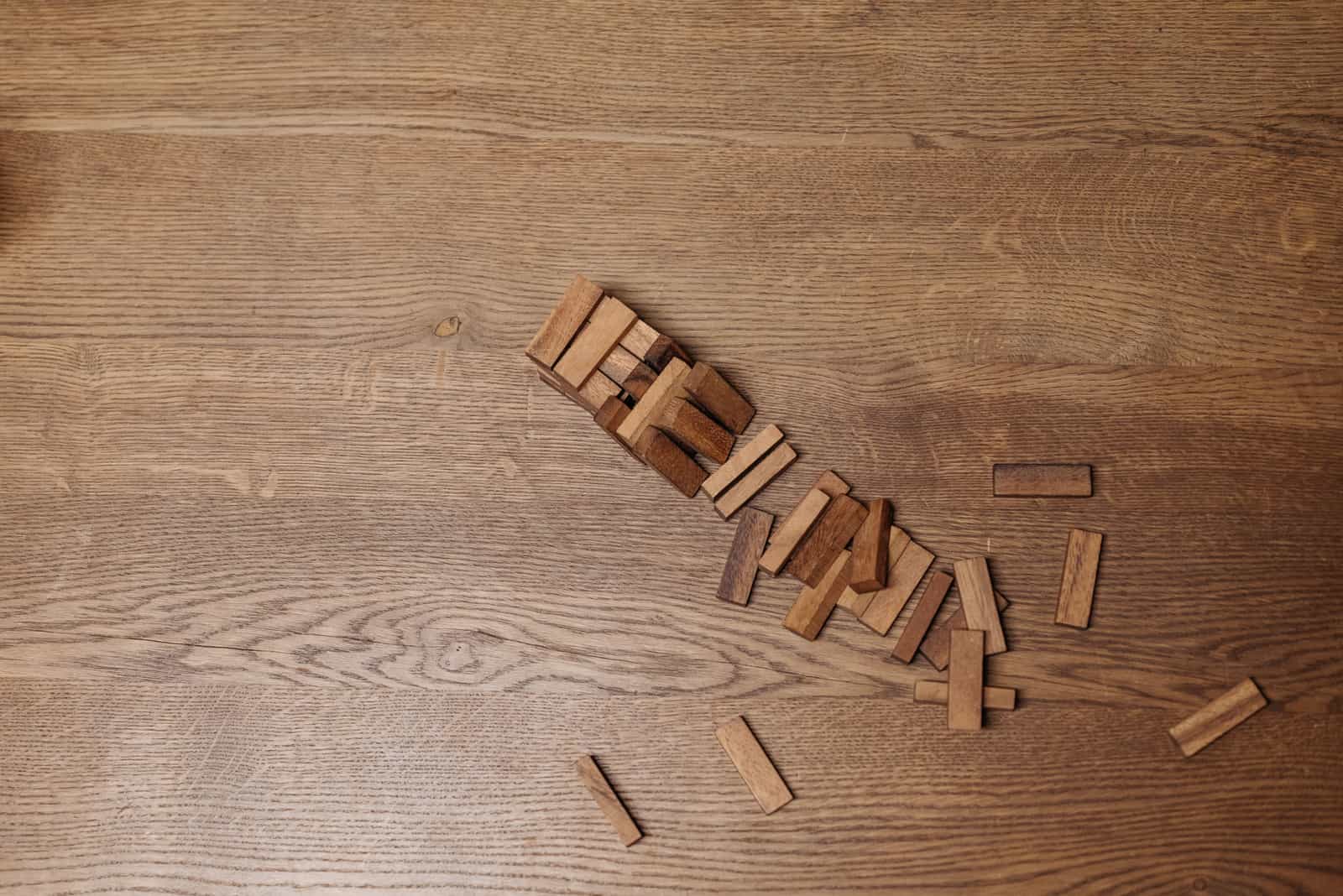 A close look along the length of a butcher-block shuffleboard surface